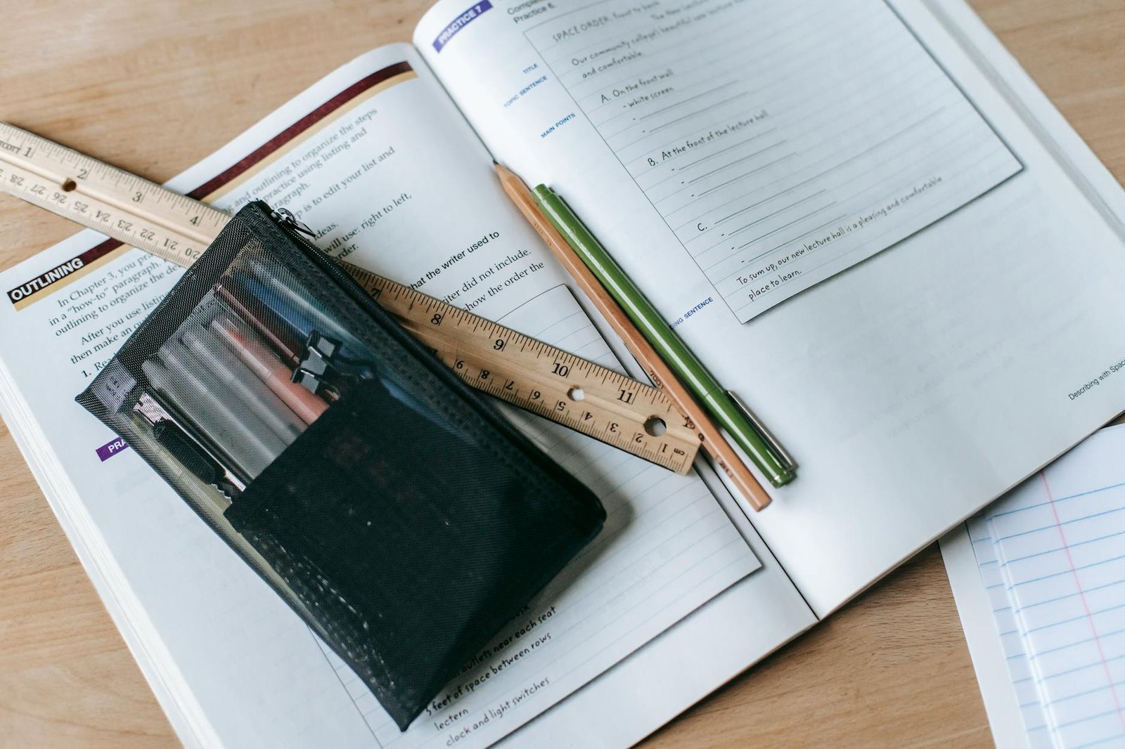 Top 100 UPSC GK Questions for Competitive Exams (With Year-wise Mention) 3 textbook with pens and ruler on table